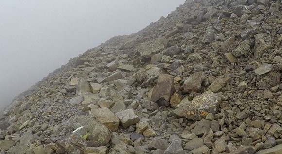 Rocky terrain in the coulds