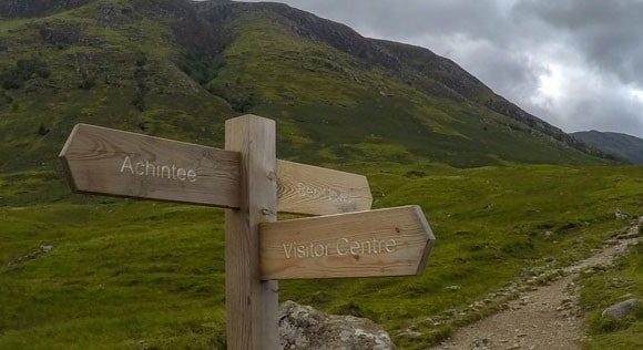 three-way sign post