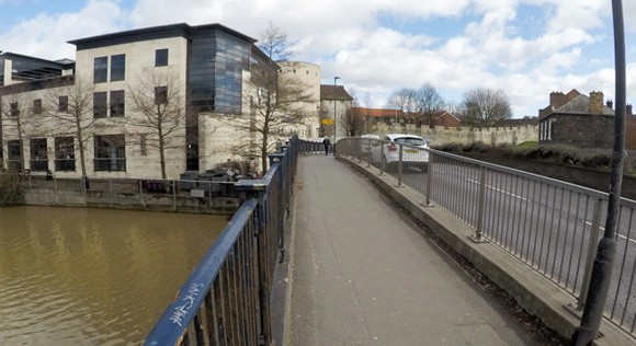 Crossing the Foss Bridge