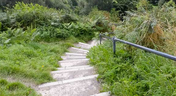 Steps leading down from top of white horse